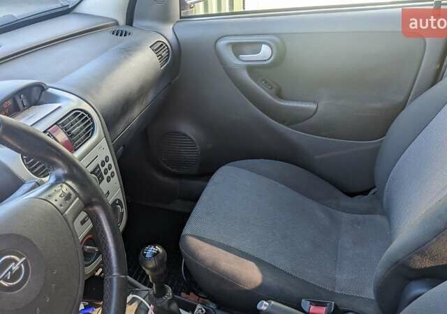 Синий Опель Комбо груз.-пасс., объемом двигателя 1.6 л и пробегом 283 тыс. км за 3650 $, фото 13 на Automoto.ua