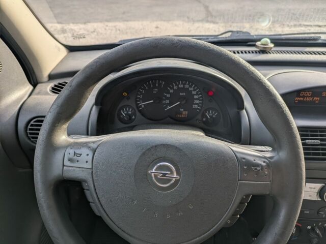 Синий Опель Комбо груз.-пасс., объемом двигателя 1.6 л и пробегом 390 тыс. км за 3200 $, фото 9 на Automoto.ua