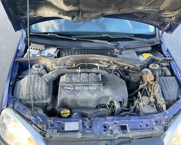 Синий Опель Комбо груз.-пасс., объемом двигателя 1.3 л и пробегом 390 тыс. км за 1900 $, фото 6 на Automoto.ua