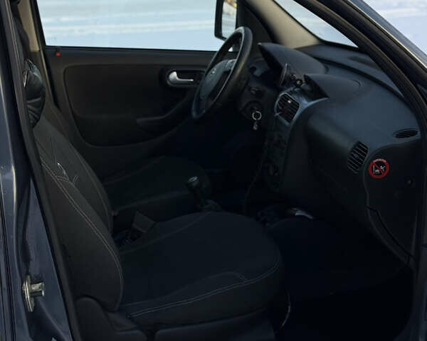 Синий Опель Комбо груз.-пасс., объемом двигателя 1.25 л и пробегом 273 тыс. км за 5200 $, фото 25 на Automoto.ua