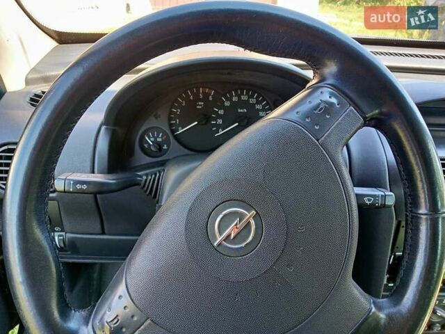 Синий Опель Комбо груз.-пасс., объемом двигателя 1.7 л и пробегом 221 тыс. км за 4500 $, фото 20 на Automoto.ua