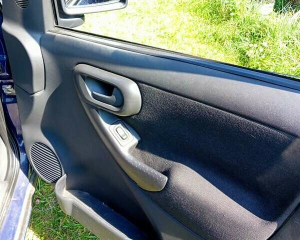 Синий Опель Комбо груз.-пасс., объемом двигателя 1.7 л и пробегом 221 тыс. км за 4500 $, фото 21 на Automoto.ua