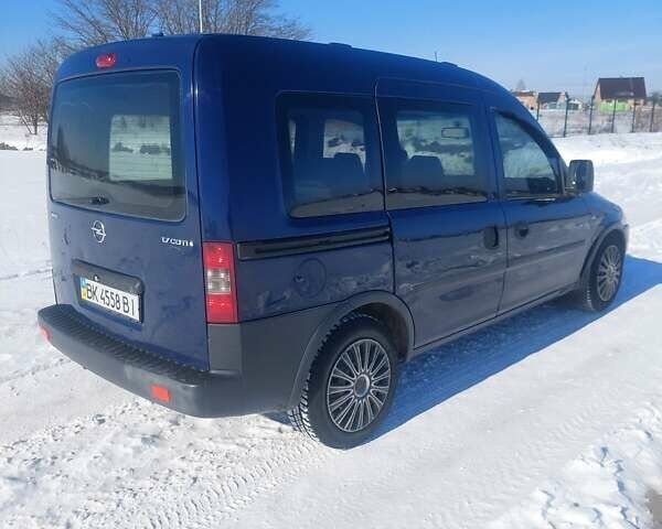 Синий Опель Комбо груз.-пасс., объемом двигателя 1.7 л и пробегом 260 тыс. км за 3300 $, фото 2 на Automoto.ua