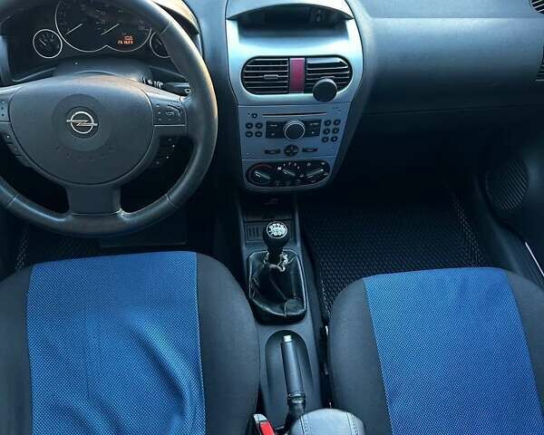 Синий Опель Комбо груз.-пасс., объемом двигателя 1.25 л и пробегом 245 тыс. км за 4450 $, фото 16 на Automoto.ua