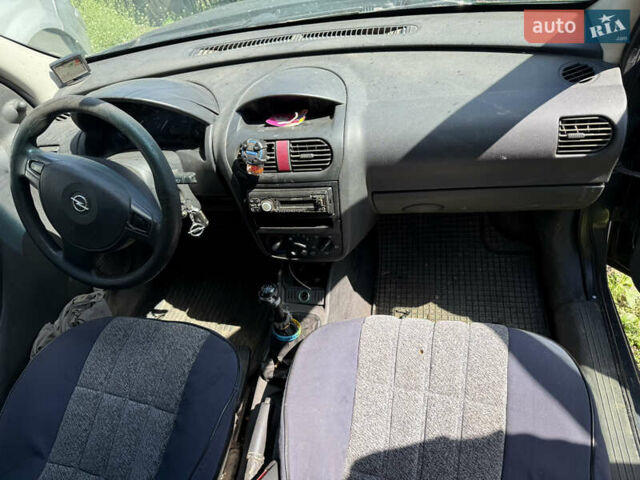 Синій Опель Комбо вант.-пас., об'ємом двигуна 1.25 л та пробігом 555 тис. км за 875 $, фото 5 на Automoto.ua