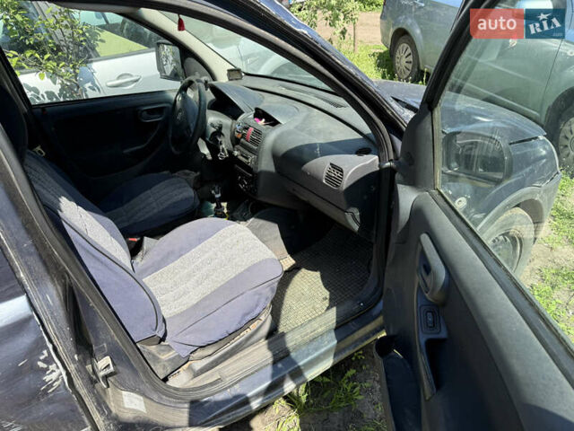 Синій Опель Комбо вант.-пас., об'ємом двигуна 1.25 л та пробігом 555 тис. км за 875 $, фото 4 на Automoto.ua