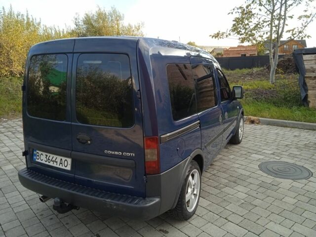 Синий Опель Комбо груз.-пасс., объемом двигателя 1.2 л и пробегом 260 тыс. км за 4600 $, фото 5 на Automoto.ua