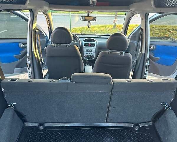 Синий Опель Комбо груз.-пасс., объемом двигателя 1.25 л и пробегом 245 тыс. км за 4450 $, фото 12 на Automoto.ua