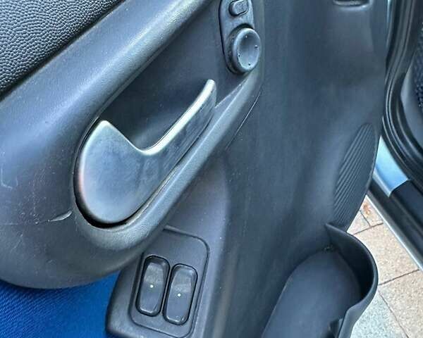 Синий Опель Комбо груз.-пасс., объемом двигателя 1.25 л и пробегом 245 тыс. км за 4450 $, фото 17 на Automoto.ua