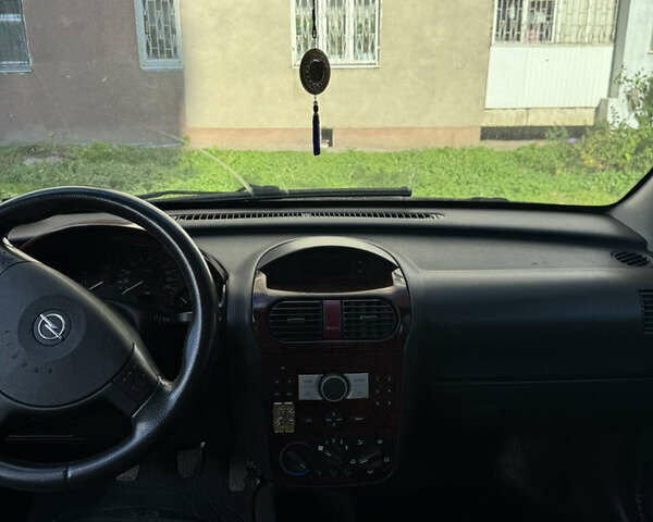 Синий Опель Комбо груз.-пасс., объемом двигателя 1.69 л и пробегом 190 тыс. км за 4800 $, фото 2 на Automoto.ua