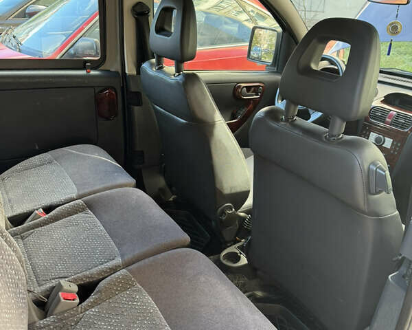 Синий Опель Комбо груз.-пасс., объемом двигателя 1.69 л и пробегом 190 тыс. км за 4800 $, фото 13 на Automoto.ua