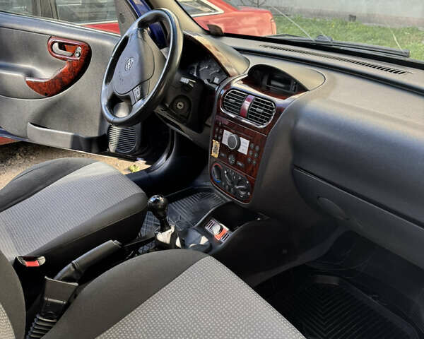 Синий Опель Комбо груз.-пасс., объемом двигателя 1.69 л и пробегом 190 тыс. км за 4800 $, фото 26 на Automoto.ua