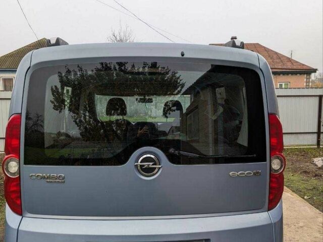 Синий Опель Комбо груз.-пасс., объемом двигателя 1.6 л и пробегом 310 тыс. км за 6500 $, фото 2 на Automoto.ua