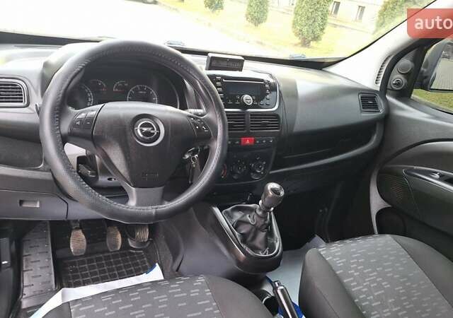 Синий Опель Комбо груз.-пасс., объемом двигателя 1.6 л и пробегом 193 тыс. км за 10800 $, фото 32 на Automoto.ua