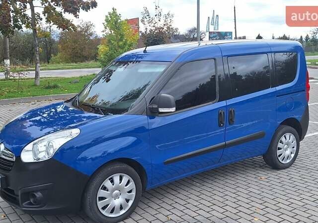 Синий Опель Комбо груз.-пасс., объемом двигателя 1.6 л и пробегом 192 тыс. км за 10850 $, фото 1 на Automoto.ua