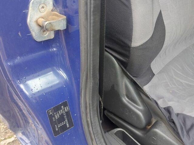 Синий Опель Комбо груз.-пасс., объемом двигателя 1.3 л и пробегом 380 тыс. км за 4200 $, фото 2 на Automoto.ua