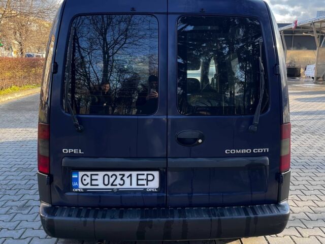 Синій Опель Комбо вант.-пас., об'ємом двигуна 1.2 л та пробігом 293 тис. км за 3800 $, фото 5 на Automoto.ua