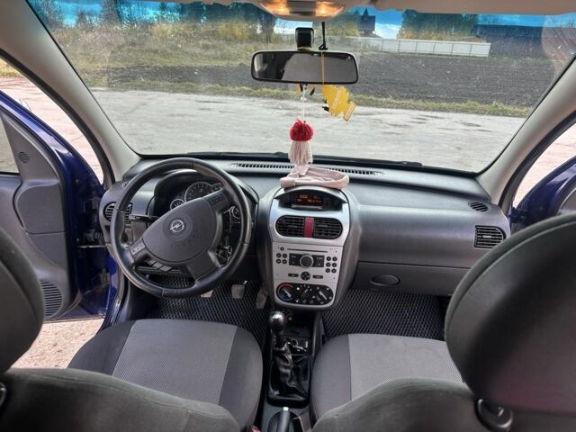 Синий Опель Комбо груз.-пасс., объемом двигателя 1.6 л и пробегом 265 тыс. км за 4000 $, фото 3 на Automoto.ua