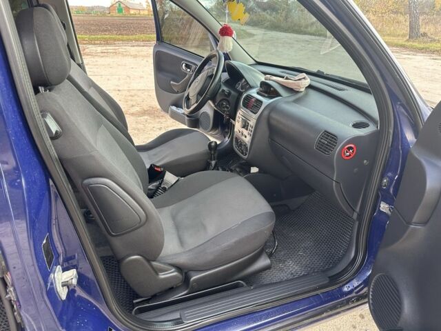 Синий Опель Комбо груз.-пасс., объемом двигателя 1.6 л и пробегом 265 тыс. км за 4000 $, фото 4 на Automoto.ua