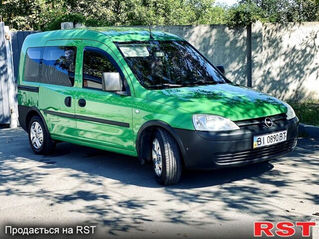 Зеленый Опель Комбо груз.-пасс., объемом двигателя 1.2 л и пробегом 255 тыс. км за 4500 $, фото 1 на Automoto.ua