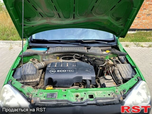 Зеленый Опель Комбо груз.-пасс., объемом двигателя 1.2 л и пробегом 255 тыс. км за 4500 $, фото 4 на Automoto.ua