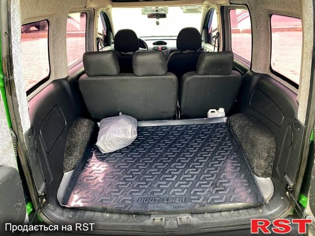 Зеленый Опель Комбо груз.-пасс., объемом двигателя 1.2 л и пробегом 255 тыс. км за 4500 $, фото 5 на Automoto.ua