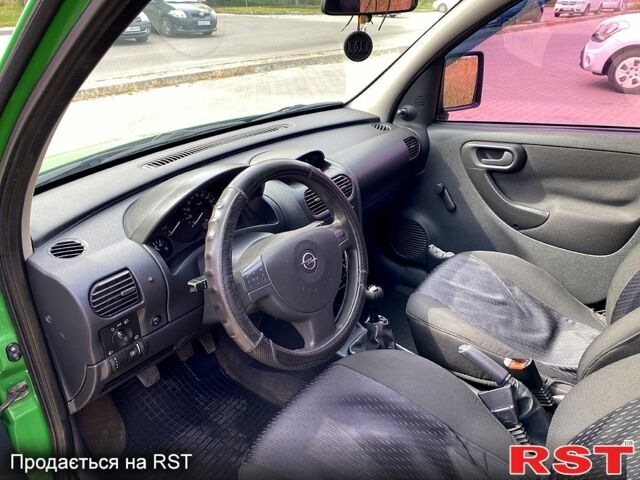 Зеленый Опель Комбо груз.-пасс., объемом двигателя 1.2 л и пробегом 255 тыс. км за 4500 $, фото 6 на Automoto.ua