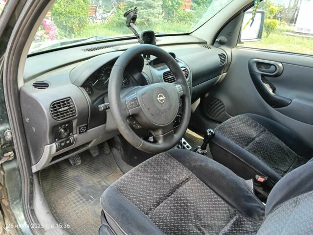 Зеленый Опель Комбо груз.-пасс., объемом двигателя 1.6 л и пробегом 368 тыс. км за 2600 $, фото 7 на Automoto.ua