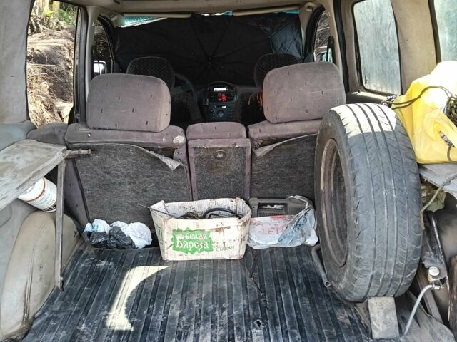 Зеленый Опель Комбо груз.-пасс., объемом двигателя 1.6 л и пробегом 368 тыс. км за 2600 $, фото 9 на Automoto.ua