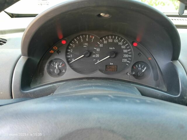 Зеленый Опель Комбо груз.-пасс., объемом двигателя 1.6 л и пробегом 368 тыс. км за 2600 $, фото 5 на Automoto.ua