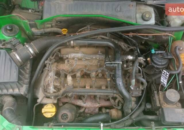 Зелений Опель Комбо вант.-пас., об'ємом двигуна 1.2 л та пробігом 325 тис. км за 1800 $, фото 4 на Automoto.ua