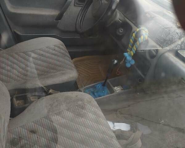 Белый Опель Корса, объемом двигателя 1.2 л и пробегом 80 тыс. км за 550 $, фото 2 на Automoto.ua