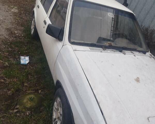 Белый Опель Корса, объемом двигателя 1.2 л и пробегом 80 тыс. км за 550 $, фото 4 на Automoto.ua