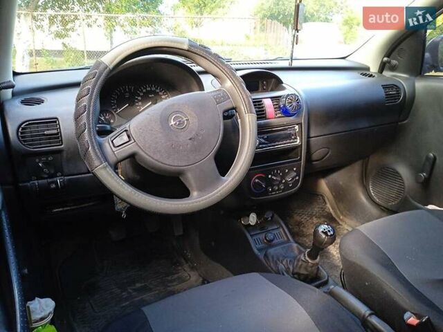 Белый Опель Корса, объемом двигателя 0.97 л и пробегом 254 тыс. км за 3000 $, фото 5 на Automoto.ua