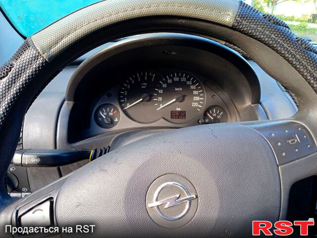 Белый Опель Корса, объемом двигателя 1 л и пробегом 254 тыс. км за 3100 $, фото 5 на Automoto.ua