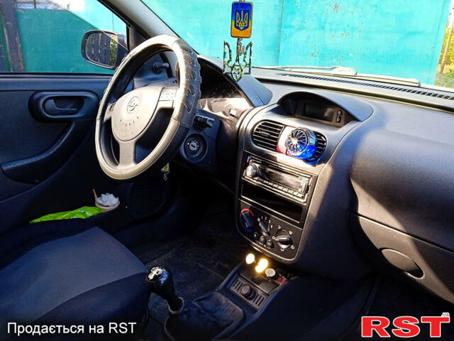 Белый Опель Корса, объемом двигателя 1 л и пробегом 254 тыс. км за 3100 $, фото 4 на Automoto.ua