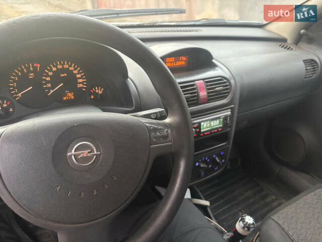 Белый Опель Корса, объемом двигателя 1.2 л и пробегом 198 тыс. км за 1550 $, фото 2 на Automoto.ua