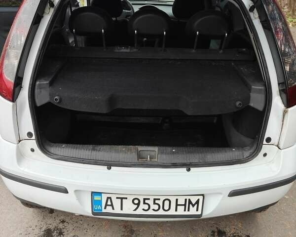Білий Опель Корса, об'ємом двигуна 1.23 л та пробігом 196 тис. км за 2600 $, фото 10 на Automoto.ua