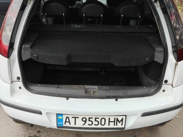 Белый Опель Корса, объемом двигателя 1.2 л и пробегом 196 тыс. км за 2600 $, фото 8 на Automoto.ua