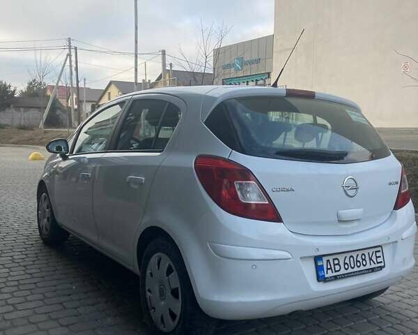 Белый Опель Корса, объемом двигателя 1.23 л и пробегом 175 тыс. км за 5099 $, фото 3 на Automoto.ua
