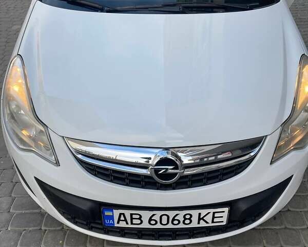 Белый Опель Корса, объемом двигателя 1.23 л и пробегом 175 тыс. км за 5099 $, фото 1 на Automoto.ua