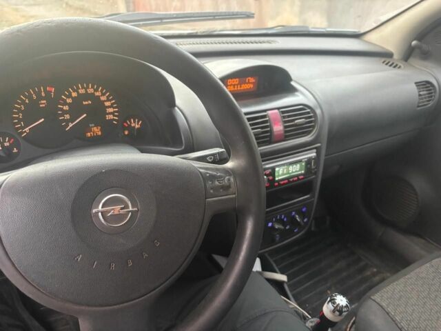 Белый Опель Корса, объемом двигателя 1.2 л и пробегом 199 тыс. км за 1550 $, фото 5 на Automoto.ua