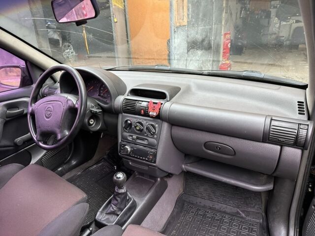 Чорний Опель Корса, об'ємом двигуна 1.6 л та пробігом 310 тис. км за 1600 $, фото 3 на Automoto.ua