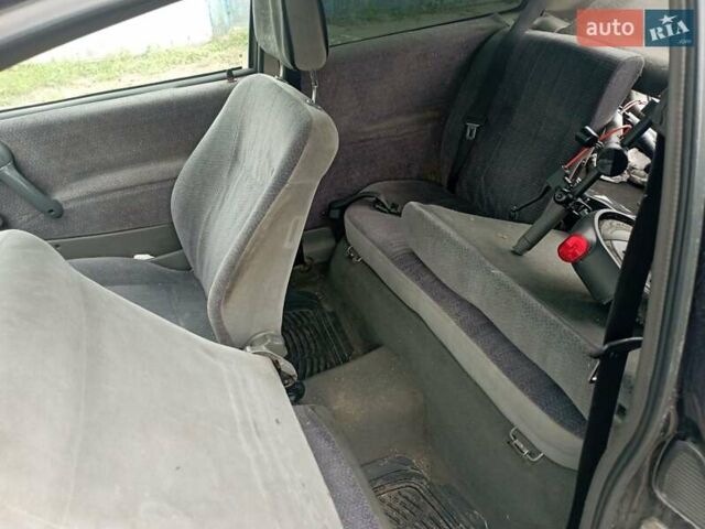 Черный Опель Корса, объемом двигателя 1.2 л и пробегом 450 тыс. км за 1700 $, фото 10 на Automoto.ua