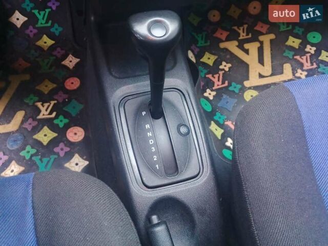 Черный Опель Корса, объемом двигателя 1.2 л и пробегом 235 тыс. км за 2200 $, фото 14 на Automoto.ua