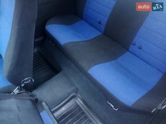 Черный Опель Корса, объемом двигателя 1.2 л и пробегом 235 тыс. км за 2200 $, фото 11 на Automoto.ua