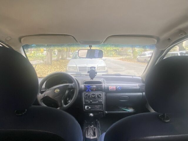 Черный Опель Корса, объемом двигателя 1 л и пробегом 310 тыс. км за 1500 $, фото 4 на Automoto.ua