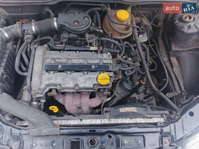 Черный Опель Корса, объемом двигателя 1.2 л и пробегом 235 тыс. км за 2200 $, фото 13 на Automoto.ua