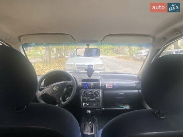 Черный Опель Корса, объемом двигателя 1 л и пробегом 310 тыс. км за 1500 $, фото 3 на Automoto.ua