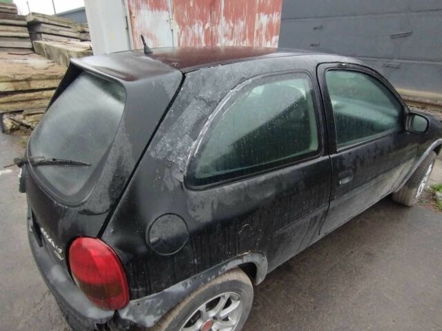 Черный Опель Корса, объемом двигателя 1 л и пробегом 1000 тыс. км за 1100 $, фото 9 на Automoto.ua